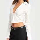 Emory Park stylish deep v neck blouse in white with a cropped design and long sleeves
