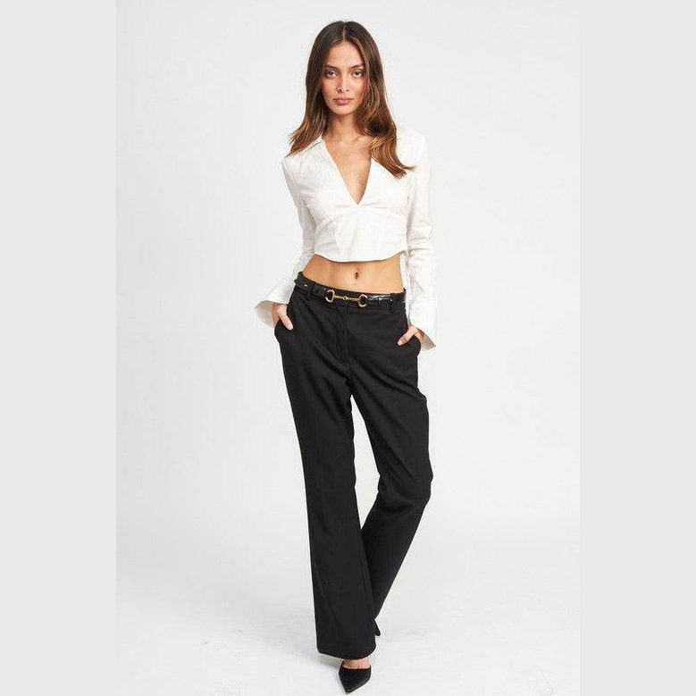 Emory Park stylish deep v neck blouse in white, perfect for pairing with high-waisted pants for a chic look.