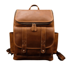 Stylish duffel bag for vacation in brown leather with spacious compartments and adjustable straps