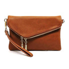 Fashion World stylish handbag for vacation in brown leather with a zip closure and wrist strap