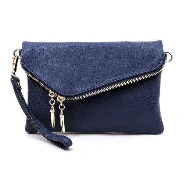 Navy stylish handbag for vacation with a zipper closure and wrist strap for convenient carrying