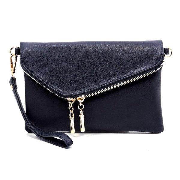 Navy stylish handbag for vacation with a sleek zip closure and detachable wrist strap