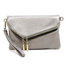 Fashion World stylish handbag for vacation in metallic silver with a sleek design and wrist strap