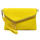 Bright yellow stylish handbag for vacation with a zip closure and wrist strap for easy carrying