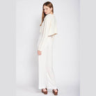 Emory Park stylish long sleeve crop shirt in cream with a chic, relaxed fit for a trendy look