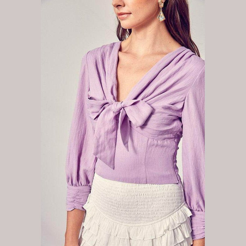 Do + Be Collection stylish long sleeve shirt in lavender with a bow detail and a flattering neckline.