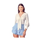 Do + Be Collection stylish long sleeve shirt with tie front detail and a flattering fit