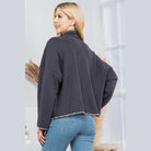 Stylish quilted coat in gray with a relaxed fit, perfect for casual outings and layering