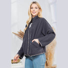 Stylish quilted coat by Orange Farm Clothing in black with floral trim and relaxed fit