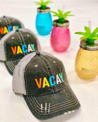 Stylish travel hat in gray with colorful 'VACAY' embroidery, perfect for summer adventures