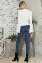 Andante USA stylish vacation blouse with bell sleeves, paired with blue jeans and ankle boots