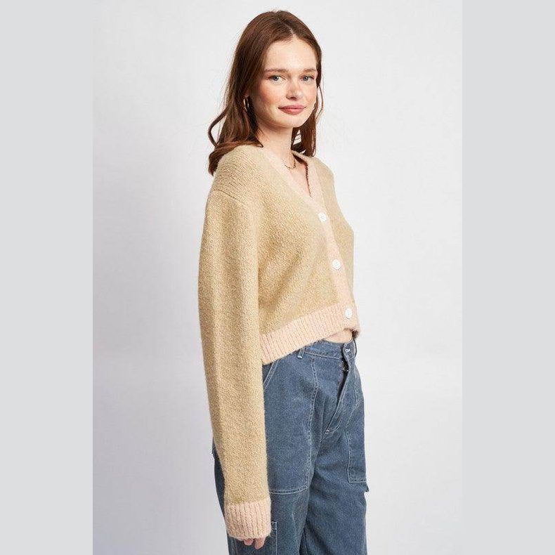 Emory Park stylish vacation cardigan in beige with pink trim, perfect for layering on warm getaways