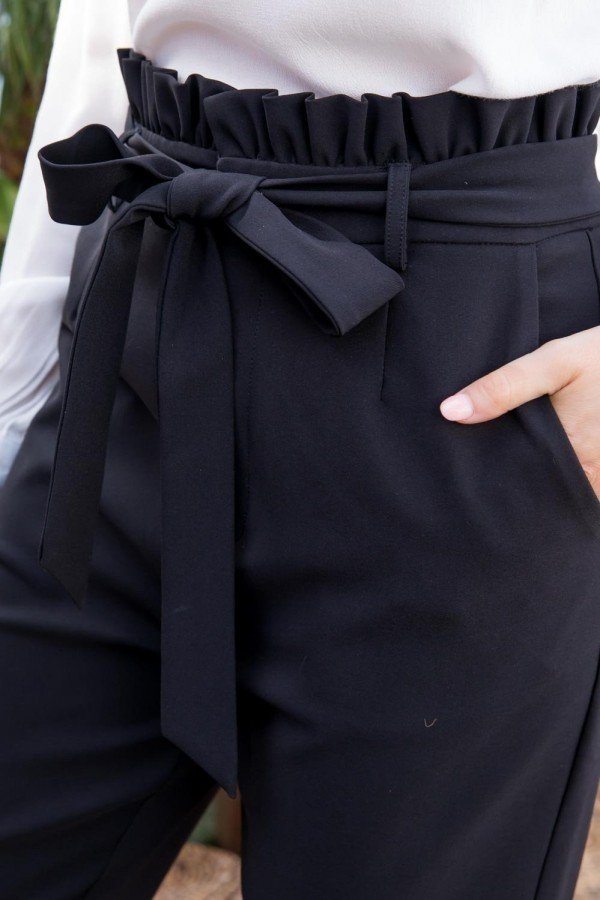 Women's black stylish vacation pants with ruffled waistband and tied belt by VacationGrabs