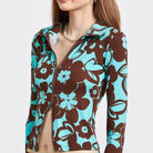 Emory Park stylish vacation top with brown and blue floral pattern and zip closure for casual outings