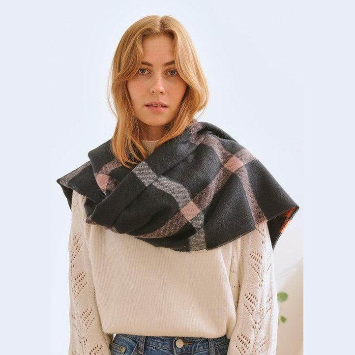 Bella Chic stylish winter scarf for vacations featuring a classic plaid design, perfect for layering