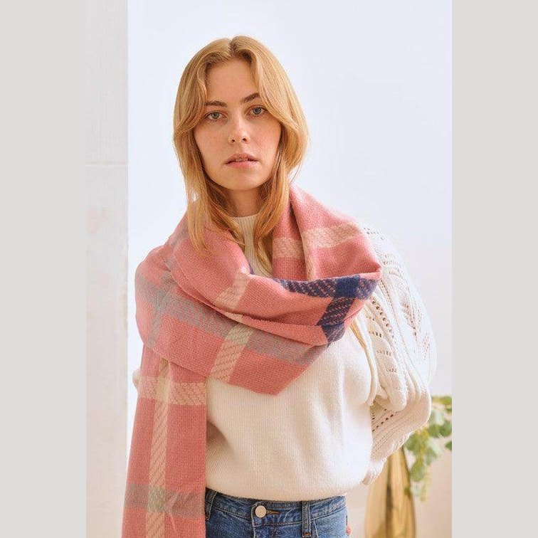 Bella Chic stylish winter scarf for vacations worn by a model with a soft sweater