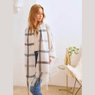 Bella Chic stylish winter scarf for vacations in a soft plaid pattern, perfect for layering and warmth.