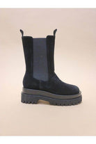 Stylish women's boots vacation in black with chunky sole and side elastic for easy wear