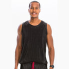 Men's summer metallic tank top in black by VacationGrabs worn by model smiling
