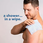 Man using VacationGrabs individually wrapped gym wipes to freshen up and clean skin after workout