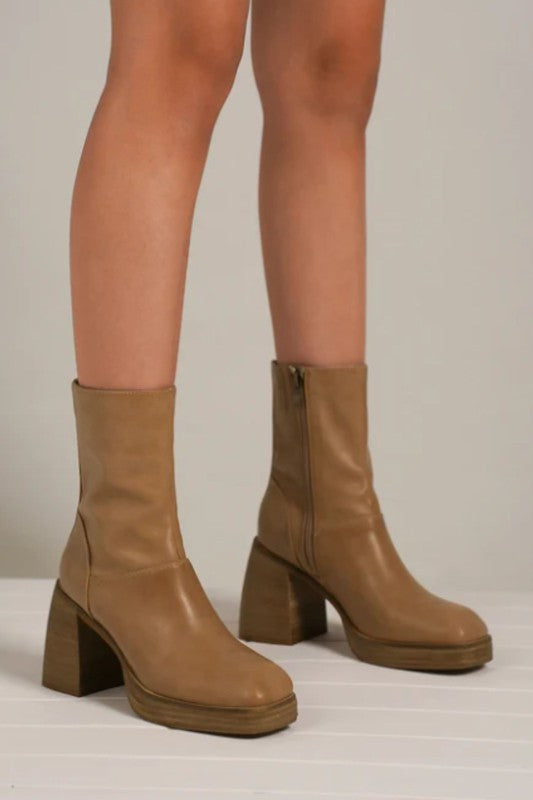 Tan chunky heel boots for women featuring a stylish zip design and comfortable fit