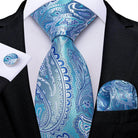 Teal blue paisley necktie from VacationGrabs paired with a matching pocket square and cufflink