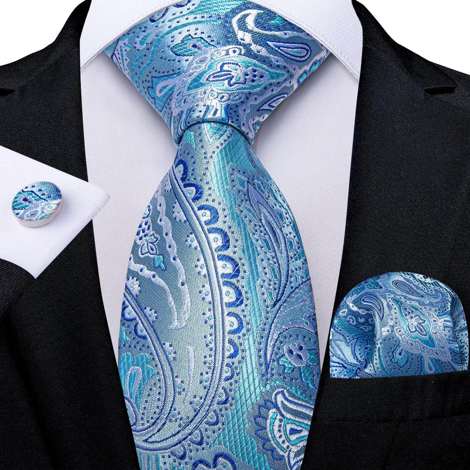 Teal blue paisley necktie from VacationGrabs paired with a matching pocket square and cufflink