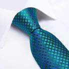 Teal blue paisley necktie by VacationGrabs with a vibrant patterned design for stylish men's accessories