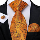 Teal blue paisley necktie with matching pocket square and cufflinks for formal men's accessories