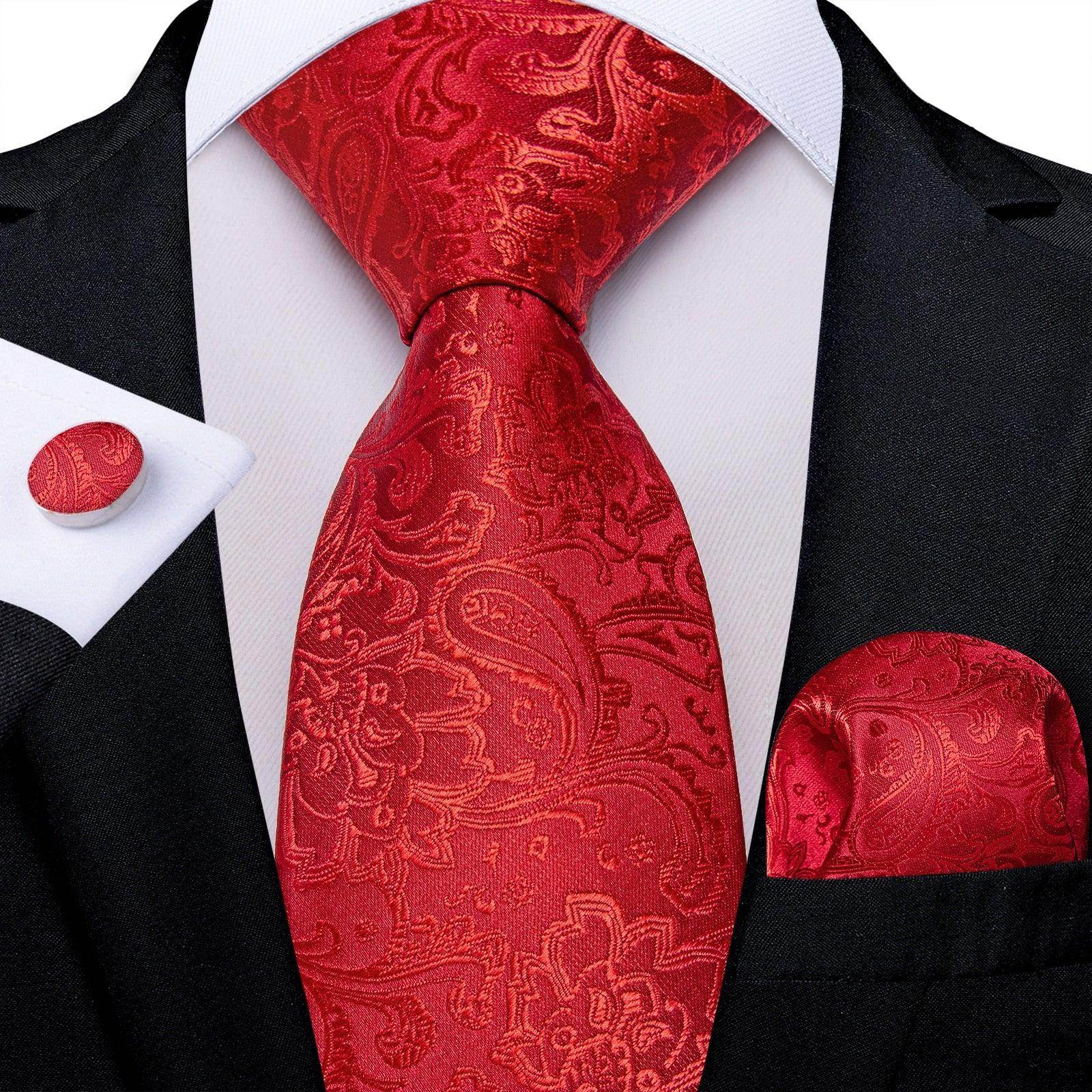 Stylish red tie with matching pocket square and cufflink for formal occasions