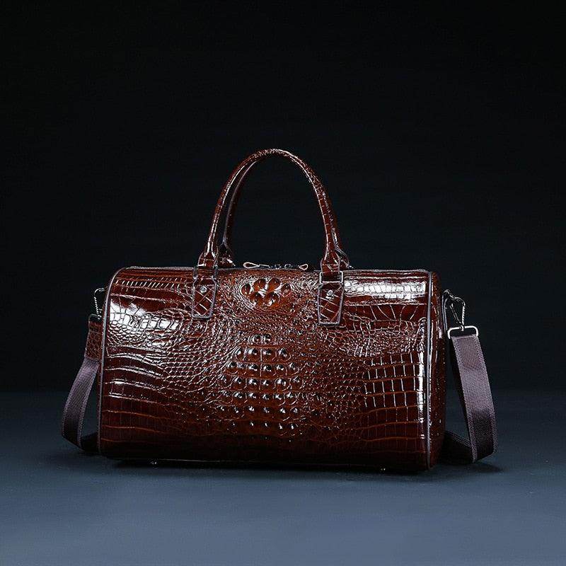 Textured leather travel bag by VacationGrabs in rich burgundy color with stylish handles and strap
