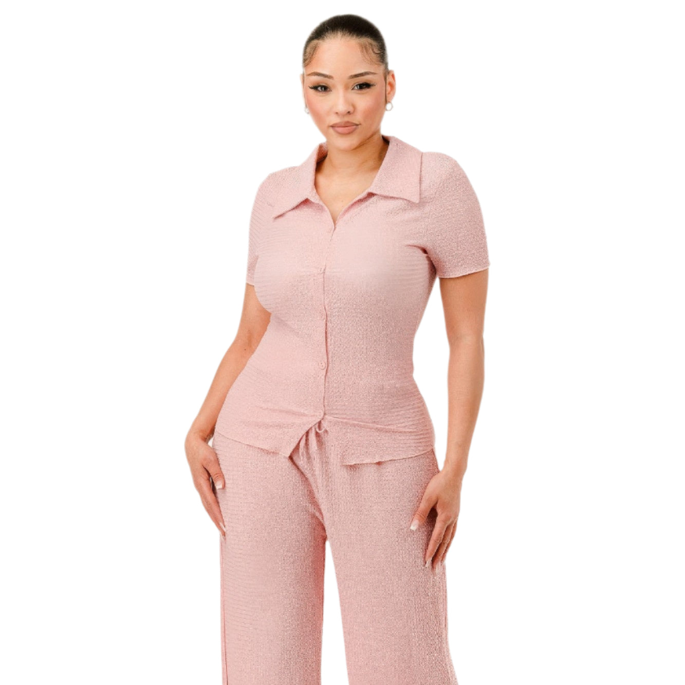 Women wearing textured pink pants set with short sleeves and collared top by VacationGrabs