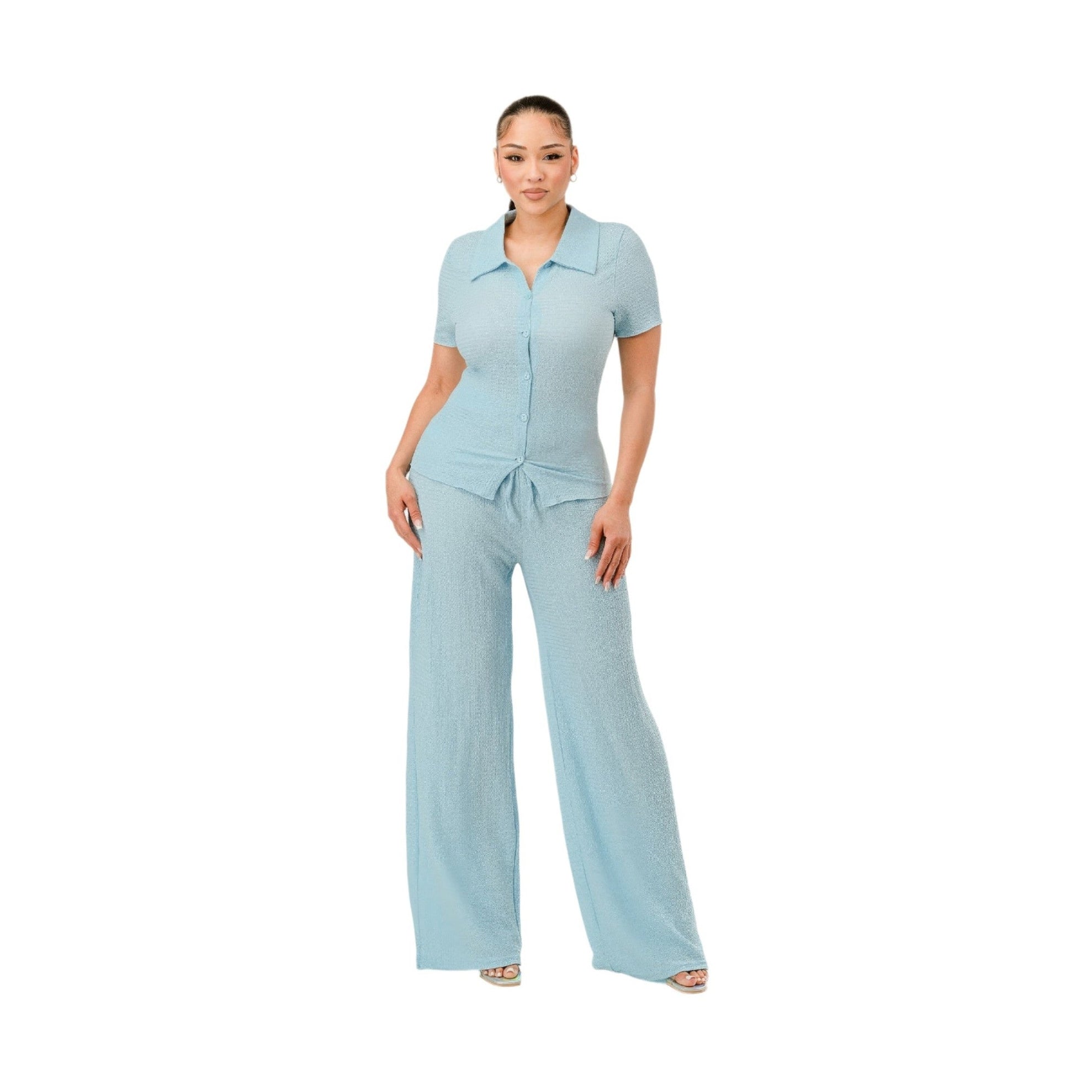 Woman wearing a light blue textured polo set for women with short sleeves and wide-leg pants