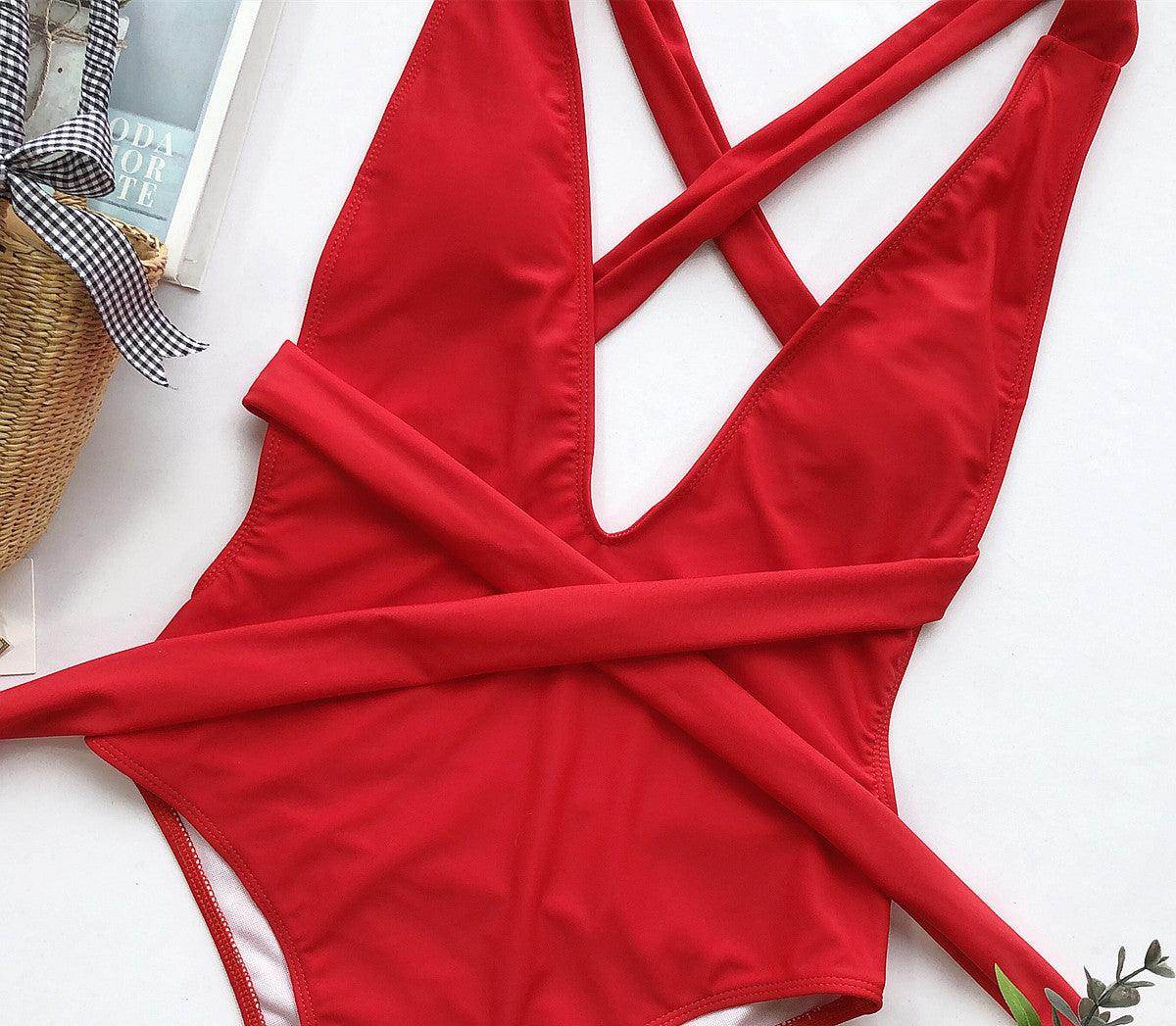 Trendsi tied one-piece swimwear in vibrant red with crisscross straps for stylish beach outings