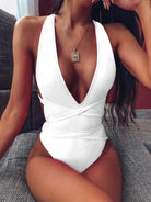 Trendsi tied one-piece swimwear in white with a deep V neckline and stylish wrap design