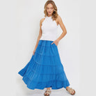 VacationGrabs blue tiered maxi skirt for women paired with white sleeveless top and sandal