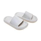 Women's vacation style sandals in white with a comfortable slip-on design for casual outings