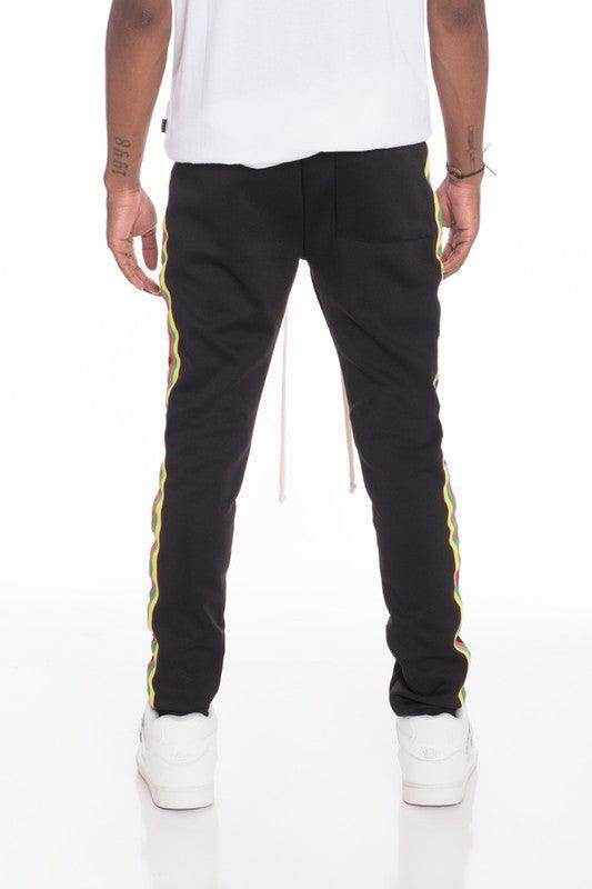 Men's WEIV side taped track pants in black with colorful side stripes for a stylish sporty look