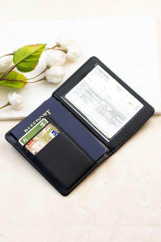 Aili's Corner travel credit card holder in black leather with space for cards and a passport