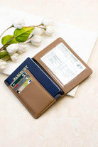 Aili's Corner travel credit card holder with passport pocket and slots for cards and travel documents