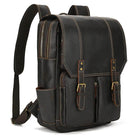 Brown travel leather backpack with multiple pockets and adjustable straps for comfortable use
