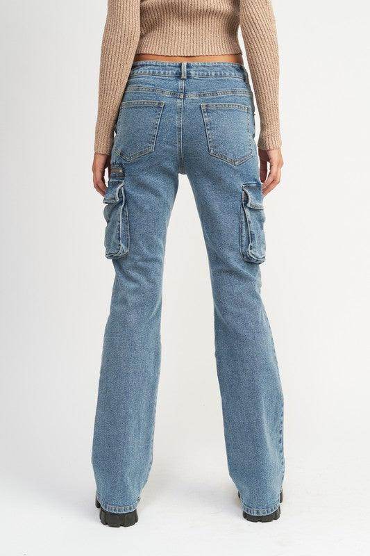 Emory Park trendy denim pants for women with a flared leg and cargo pockets at the back
