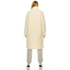 Andante USA trendy ivory outerwear with a stylish long design, perfect for layering in cooler weather