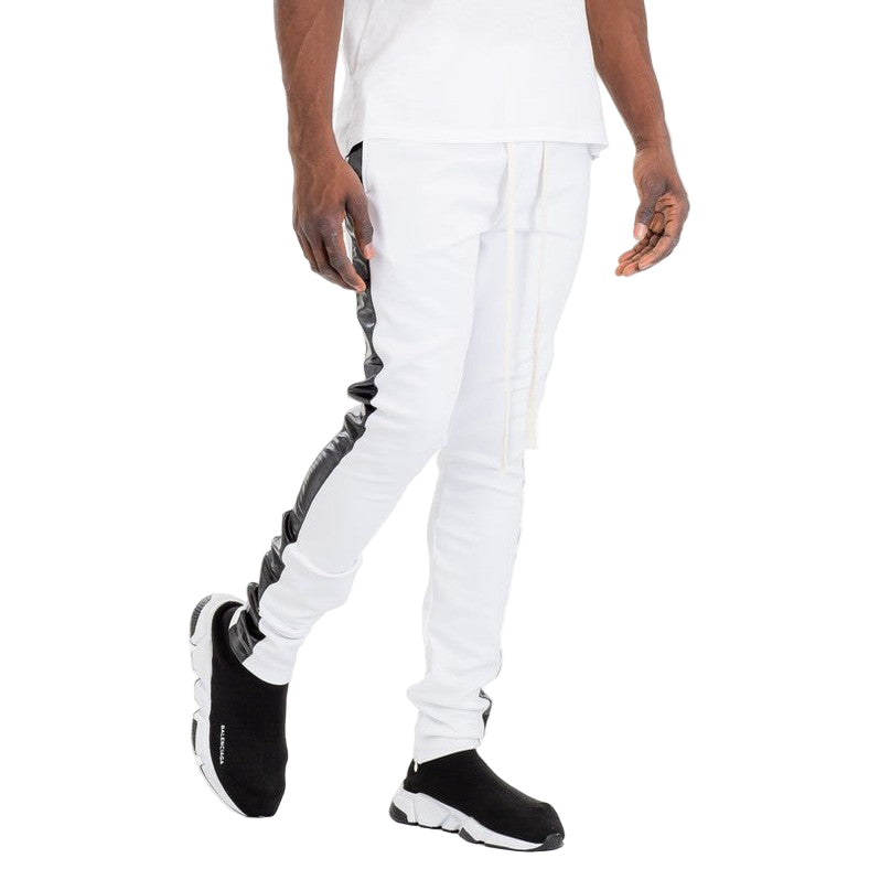 WEIV trendy leather stripe joggers in white with black leather side stripes worn with black slip-on sneakers