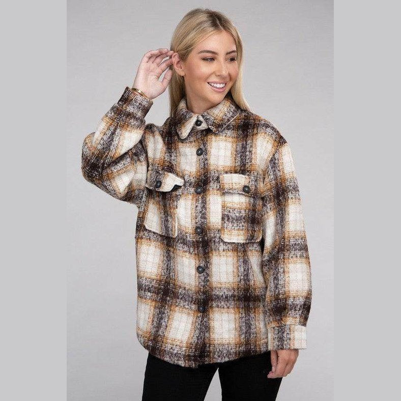 Women wearing a trendy plaid shacket jacket from Ambiance Apparel with button details and pockets