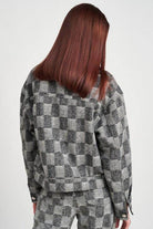Emory Park trendy travel jacket in a black and gray checkered pattern for stylish comfort on the go