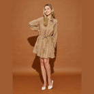 Stylish Mustard Seed twisted belt shirt dress in beige with a flattering silhouette and long sleeves