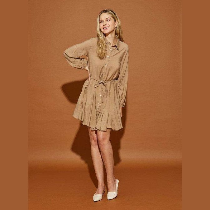 Stylish Mustard Seed twisted belt shirt dress in beige with a flattering silhouette and long sleeves