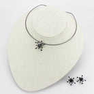 Unique vacation jewelry for women featuring a choker necklace and matching stud earrings