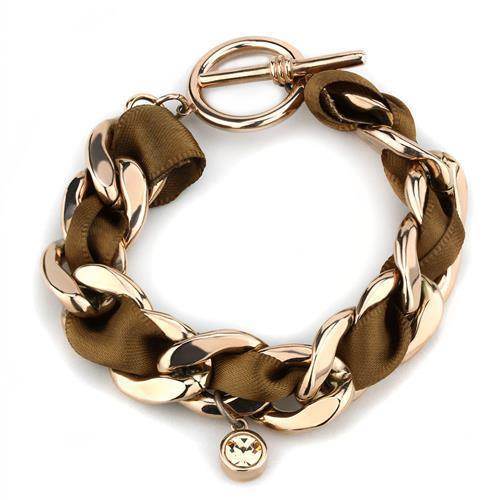 Chunky gold-tone chain bracelet with brown ribbon, perfect as vacation jewelry for women